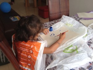 We are learning the color blue so I got out the blue paint. After a lot of set up, she on,y painted 5 min. Ugh...