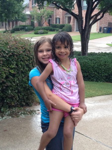 Drinched after playing with neighbors in the rain with water balloons and water guns! Lots of fun!