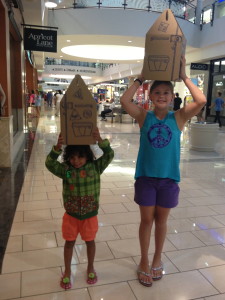 Girls carrying their Build a Bear boxes on their heads. Lanie found this to be the easiest way to carry them!