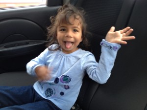 Lanie is playing guitar with the music videos playing in the back of Mauricio's car. Colombia is full of music everywhere and Lanie lives to dance!