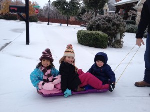 Lanie experiences snow.  "What is this?" She asked and then LOVED playing in it.