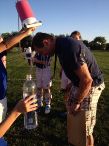 Dad has a great year coaching soccer.  The team celebrates their undefeated season!